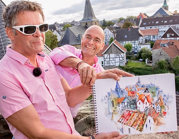 artistrave twins: Ian Fennelly and Sebastian from artistravel in front of a wonderful Hattingen-view